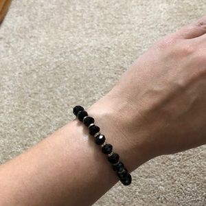 Black and gold stacking bracelet.
